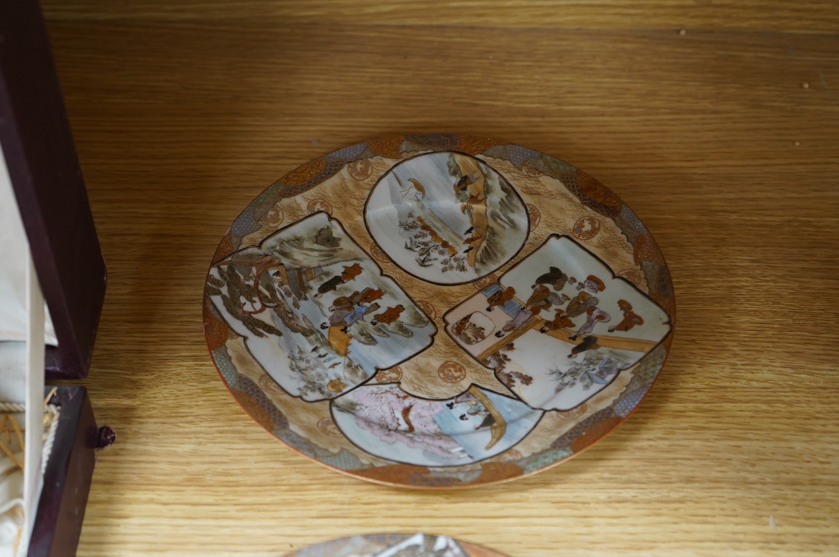 A set of nine early 20th century Japanese Kutani plates, largest 21.5cm